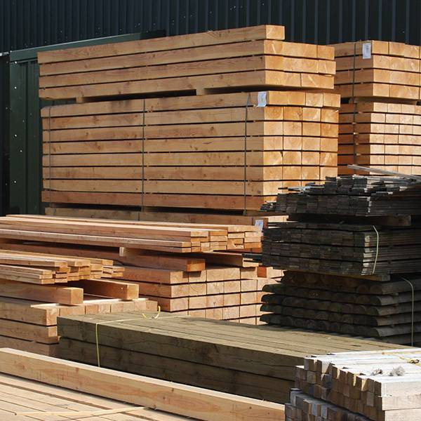 Sawn structural timber stacked in the yard